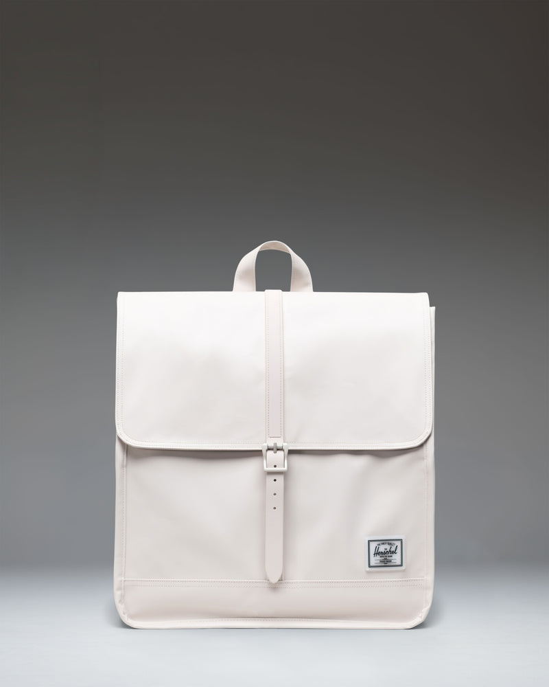 Herschel Supply Co. City Backpack in Moonbeam Tonal, showing the front view with a single strap closure and a clean, minimalist design.