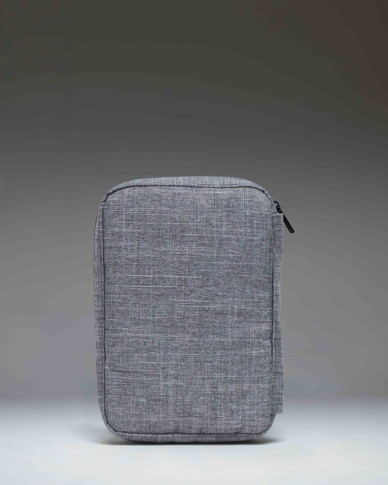 Herschel Supply Co. Burrard Organizer Tech in Raven Crosshatch, showing a detailed close-up of the textured grey fabric and zipper.