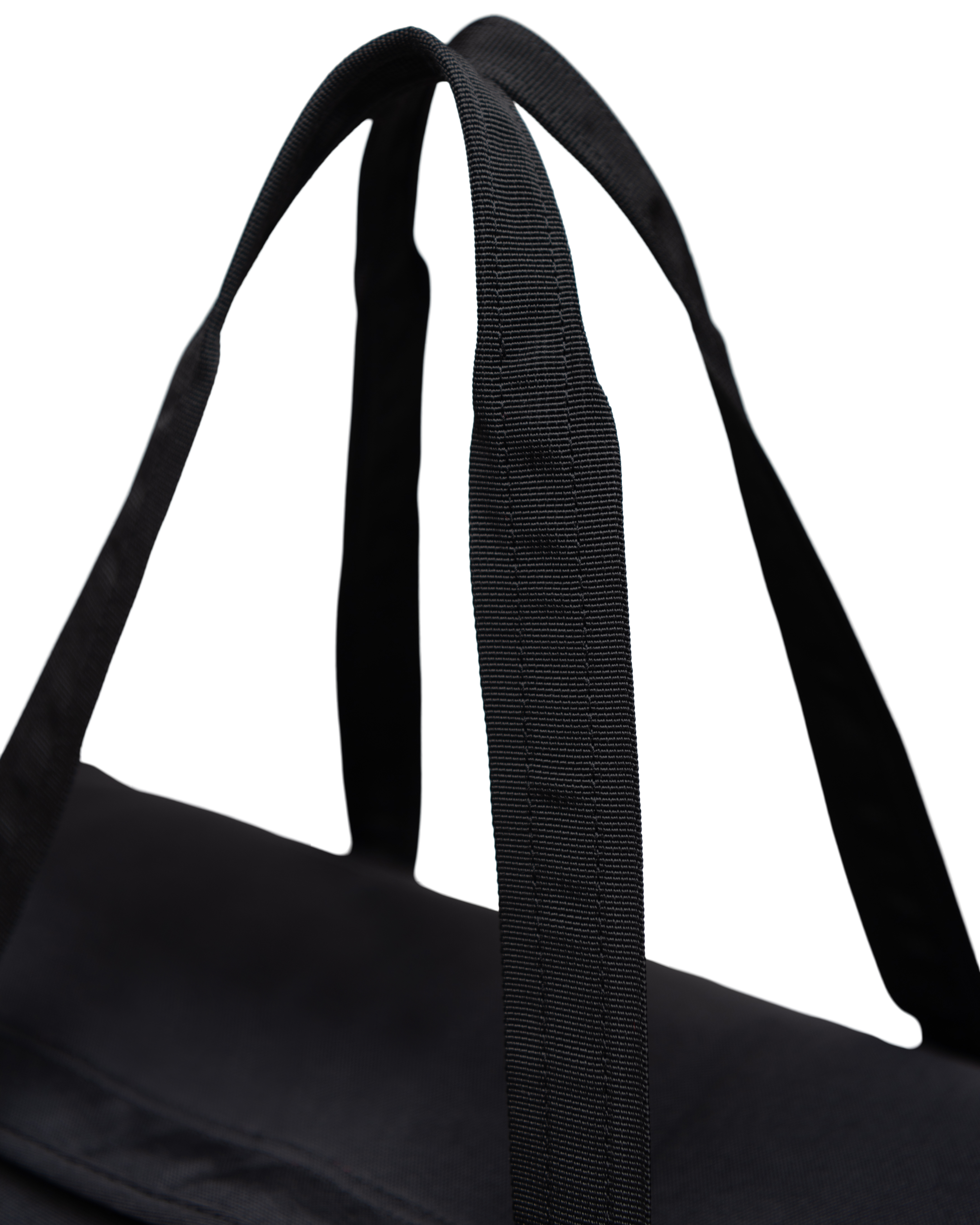 Herschel Heritage Duffle bag shown in use or display, highlighting its classic design, diamond detail, and easy-access U-shaped opening.