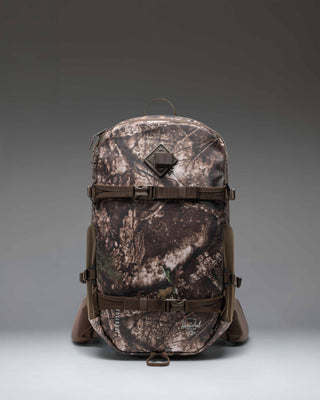 Herschel Supply Co. Realtree All Season Pro Backpack 36L in Realtree APX Camo pattern, showing a close-up of the outdoor hunting bag.