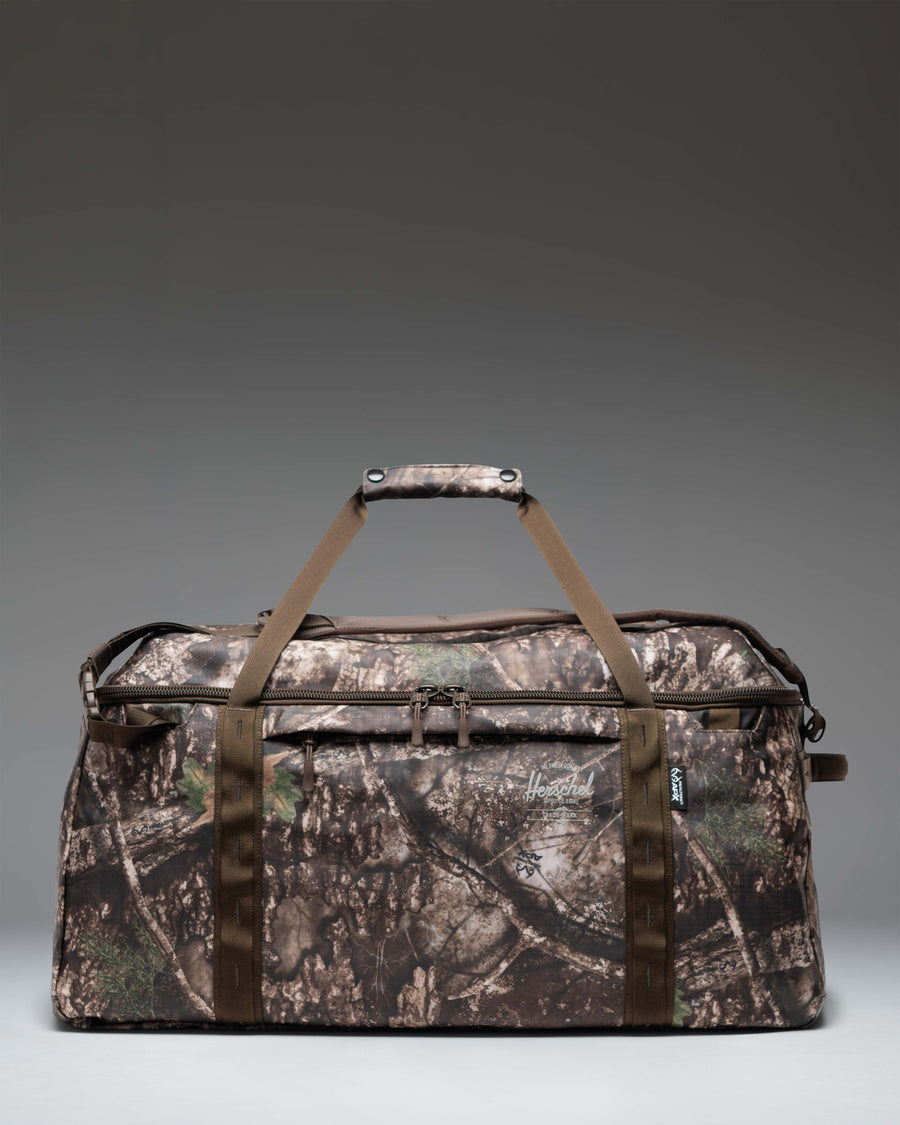 Herschel Supply Co. Realtree All Season Duffle 66 L in Realtree APX Camo.