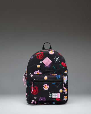 LEGO Herschel Heritage Kids Backpack in Falling Florals color, featuring a vibrant floral pattern with LEGO brick graphics.