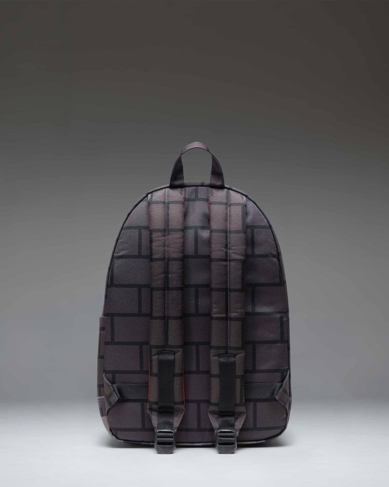 Minecraft Herschel Classic Backpack in The Nether colorway, featuring a pixelated red and black pattern inspired by the video game.