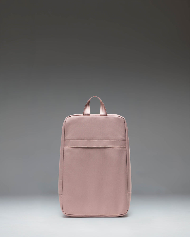 Herschel Heritage Shoe Bag in Ash Rose pink, featuring a main zipper compartment and a convenient top carrying handle.