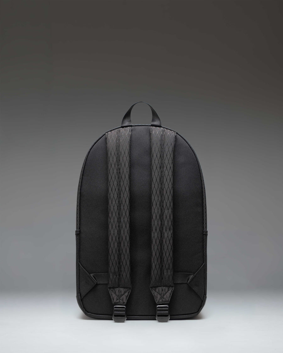 Herschel Supply Co. Kaine Backpack in Black Diamond/Black featuring a spacious design with mesh side pockets and dual adjustable shoulder straps.