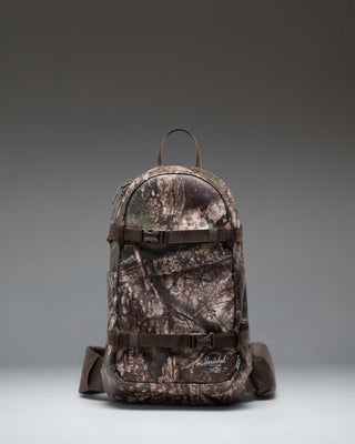 Herschel Supply Co. Realtree All Season Resort Backpack 14L in Realtree APX Camo pattern, showing a front view.