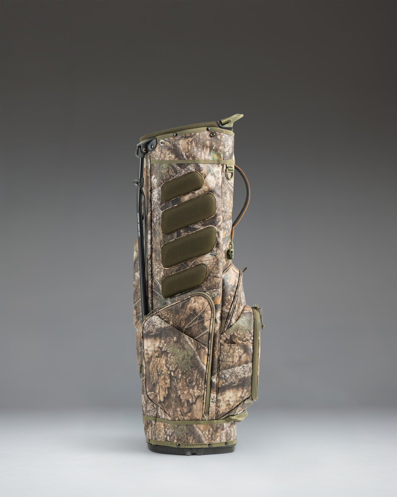Realtree Herschel Watt Stand Bag in Realtree APX Camo pattern on a white background.