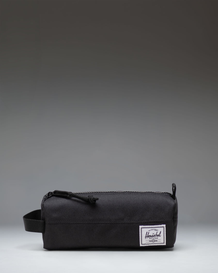 Herschel Supply Co. Settlement Pencil Case Little Herschel in black, showing the classic zippered pouch design.