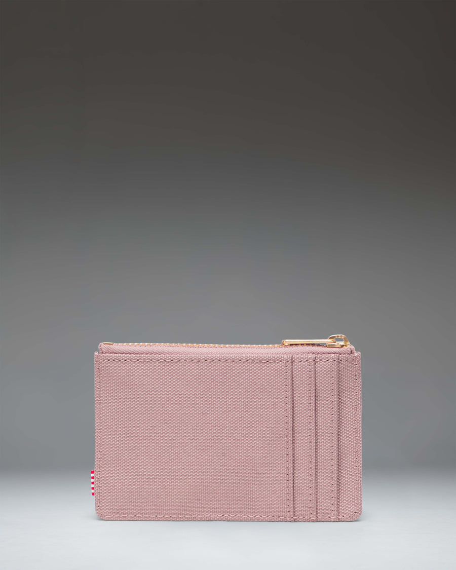 Herschel Supply Co. Oscar Cardholder wallet in Ash Rose pink.