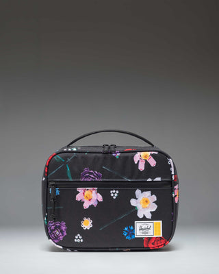 Herschel Supply Co. x LEGO Pop Quiz Lunch Box in the Falling Florals print, featuring a black background with colorful LEGO brick flower patterns.