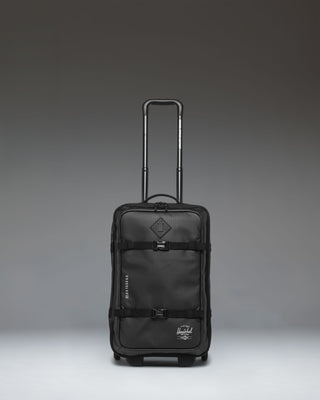 Herschel Supply Co. All Season Hybrid Roller Bag Large Carry On in black, showing the front exterior view of the luggage.