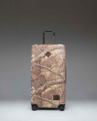 Realtree Herschel Heritage Large Luggage in Realtree APX Camo.