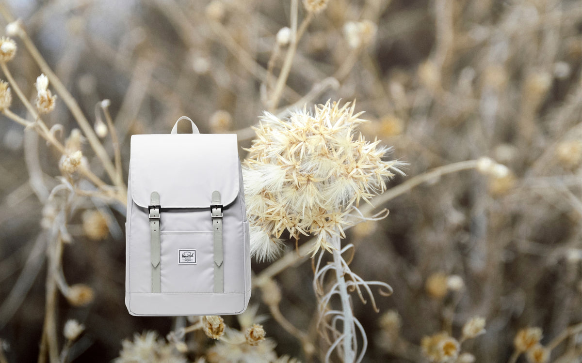 Herschel Retreat Small Backpack in Metal color shown from the front against a neutral background.