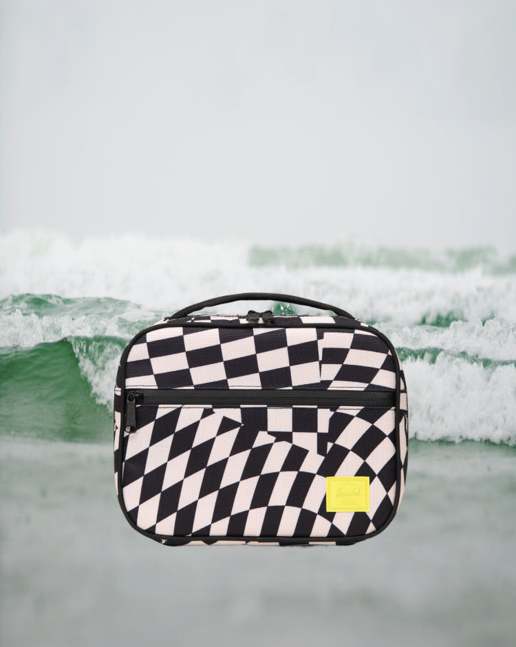 Herschel Supply Co. Pop Quiz Lunch Box Little Herschel in Warp Check, featuring a black and white checkered pattern.