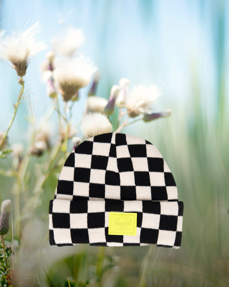 Herschel Supply Co. Elmer Toddler Graphic Beanie (1-3 Years) in black and white checkerboard pattern with a folded cuff.